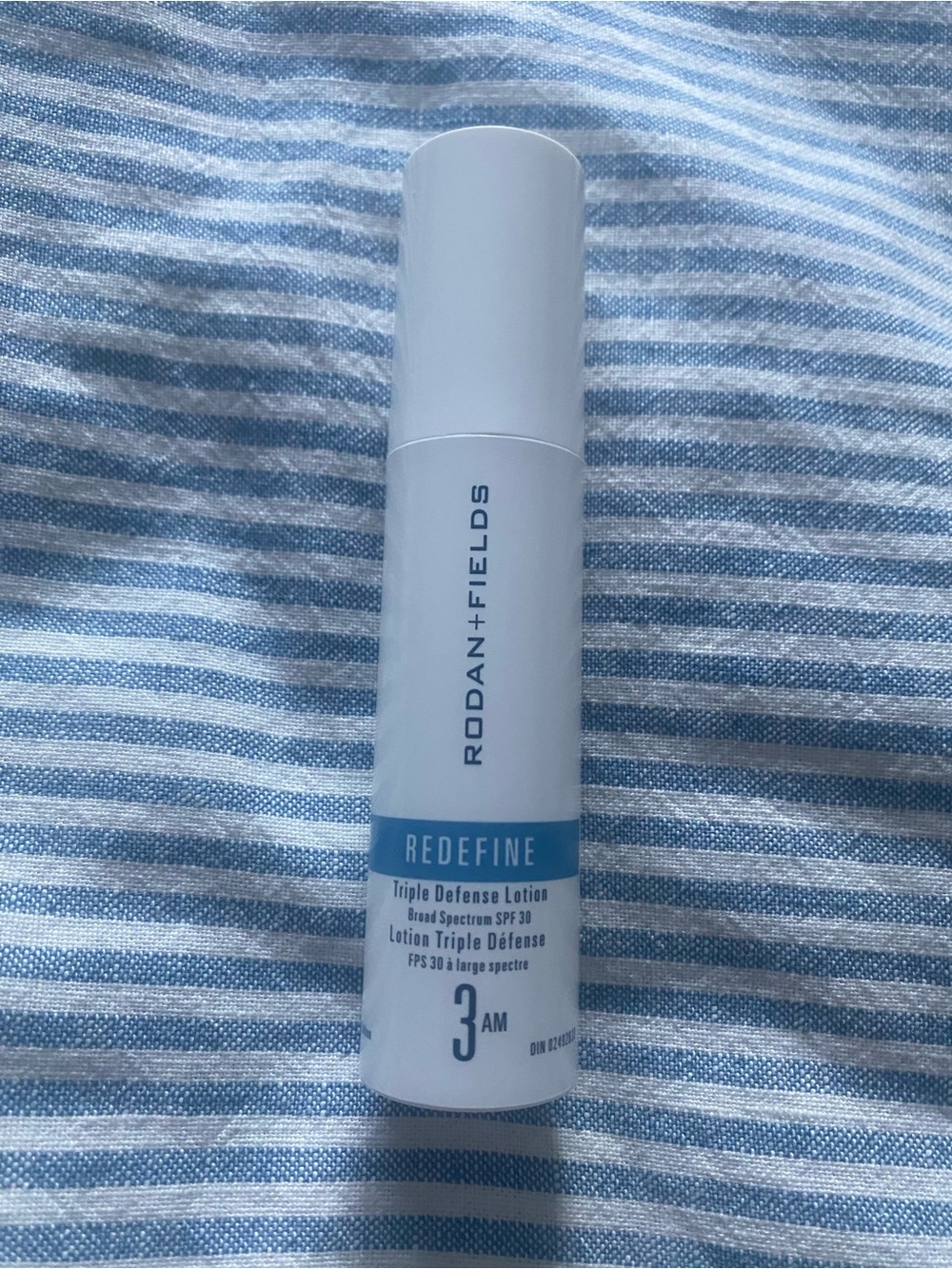 Rodan + Fields White and Blue REDEFINE Triple Defense Lotion SPF 30
